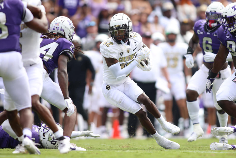 Sep 2, 2023; Fort Worth, Texas, USA; Colorado Buffaloes wide receiver Travis Hunter (12) runs after catching a ball in the first half against the <a class="link " href="https://sports.yahoo.com/ncaaw/teams/tcu/" data-i13n="sec:content-canvas;subsec:anchor_text;elm:context_link" data-ylk="slk:TCU Horned Frogs;sec:content-canvas;subsec:anchor_text;elm:context_link;itc:0">TCU Horned Frogs</a> at Amon G. Carter Stadium. Mandatory Credit: Tim Heitman-USA TODAY Sports