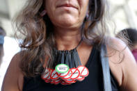 <p>Alessandra Mondolfi wears a necklace that reads “GUN CONTROL” during a protest against guns on the steps of the Broward County Federal courthouse in Fort Lauderdale, Fla., on Saturday, Feb. 17, 2018. (Photo: Brynn Anderson/AP) </p>