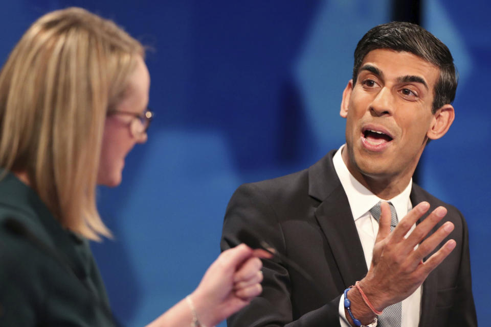 Conservatives' Chief Secretary to the Treasury Rishi Sunak, right and Labour's shadow business secretary Rebecca Long Bailey speak, during a general election debate in Cardiff, Wales, Friday, Nov.  29, 2019. (Hannah McKay/Pool Photo via AP)