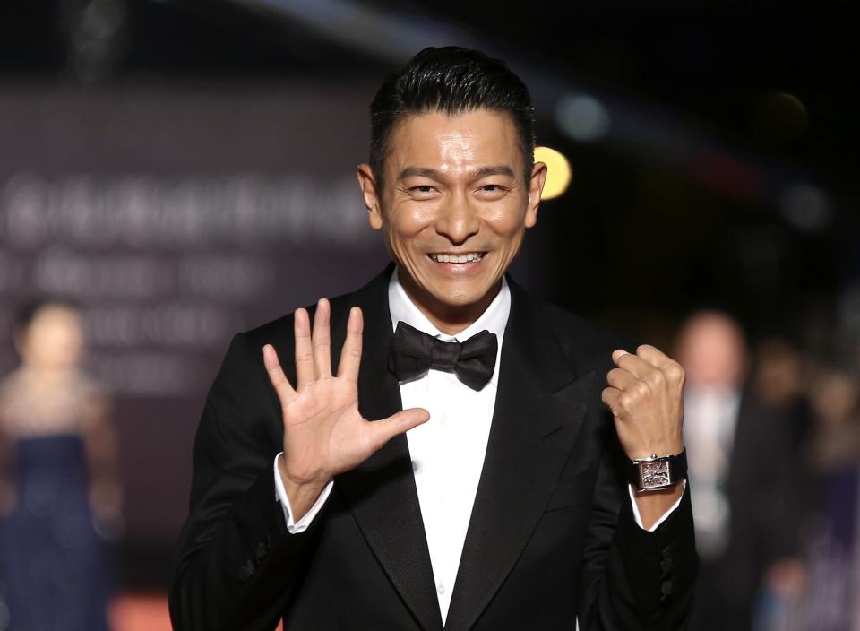 Hong Kong actor Lau poses for photographers on the red carpet at the 50th Golden Horse Film Awards in Taipei