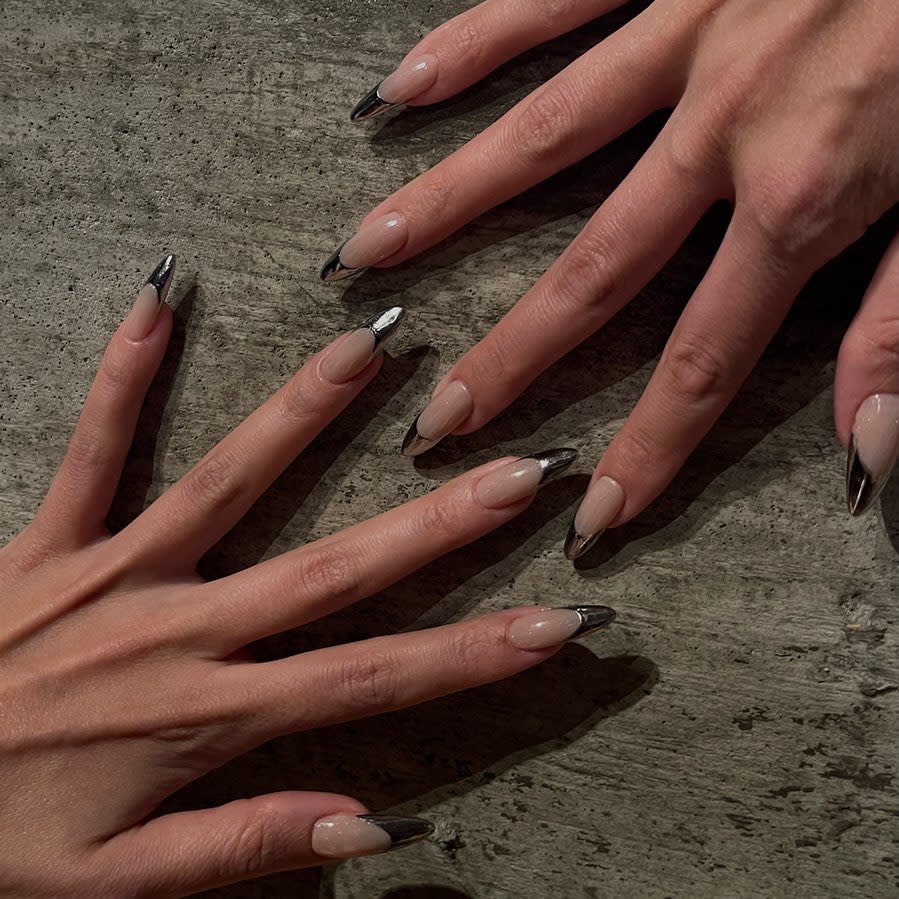 If all-around chrome is a bit too much for you, add silver chrome tips to nude nails for a hint of low-key edge.
