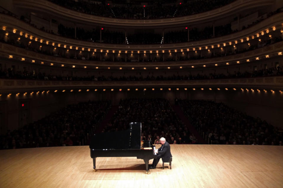 American musician Emanuel Ax plays piano onstage at Carnegie Hall, March 27, 2019. The program included music by Brahms, Benjamin, Schumann, Ravel, and Chopin. (Photo by Hiroyuki Ito/Getty Images)