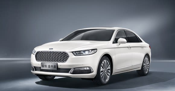 A Chinese-market Ford Taurus sedan in white.