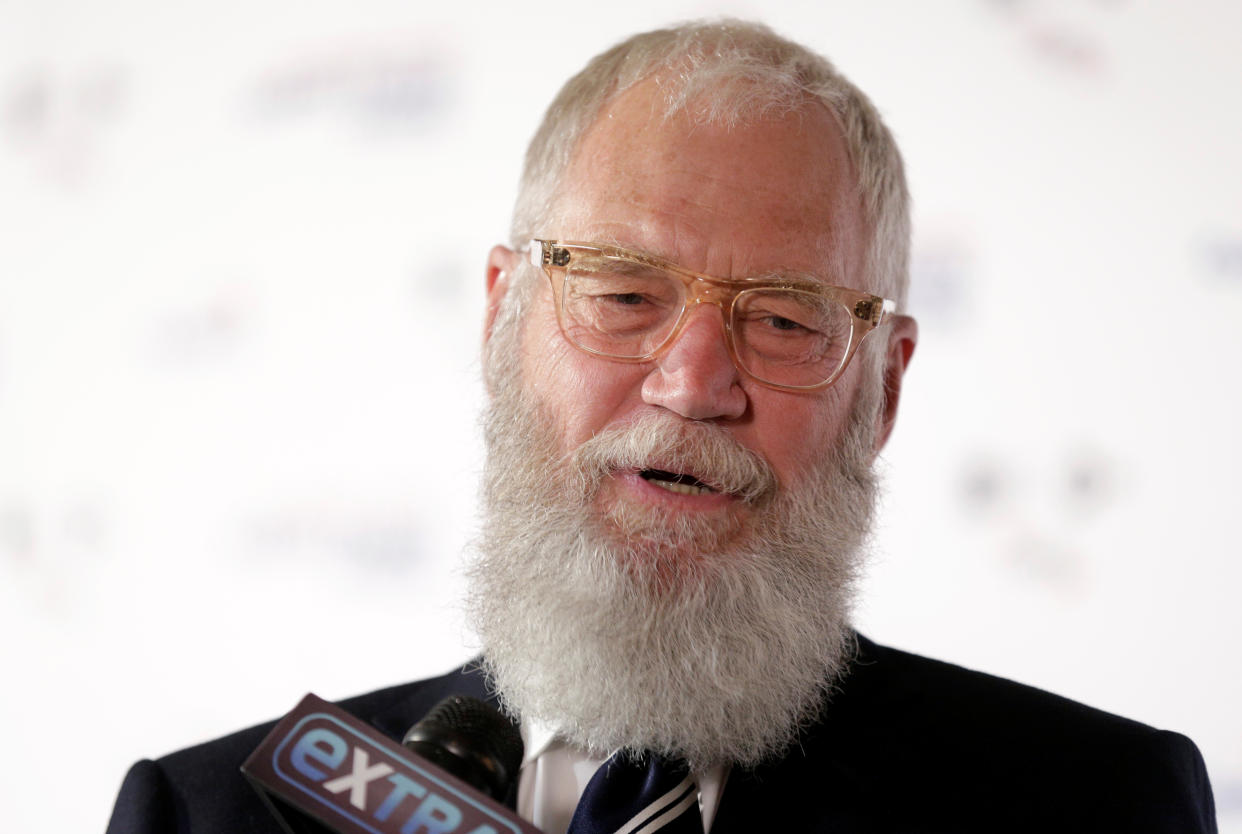 Comedian David Letterman speaks to the media as he arrives for a gala where he is receiving the Mark Twain Prize for American Humor at Kennedy Center in Washington, U.S., October 22, 2017.   REUTERS/Joshua Roberts