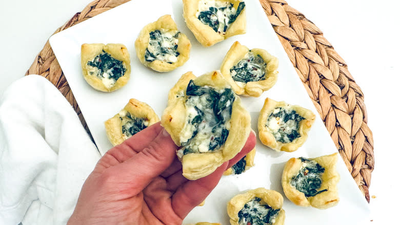 holding spinach feta pastry