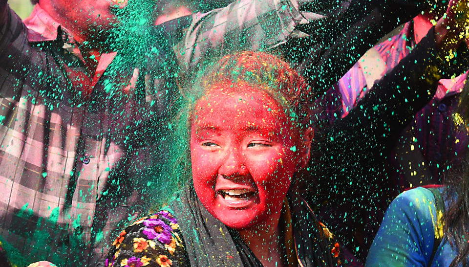 <p>Students celebrate the Holi festival on March 1, 2018 in New Delhi, India. (Photo: Raj K. Raj/ Hindustan Times via Getty Images) </p>