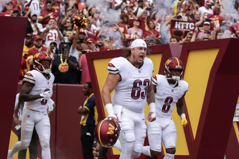 Washington Commanders running back Brian Robinson Jr. (R) should not be in starting lineups in Week 8. File Photo by Tasos Katopodis/UPI