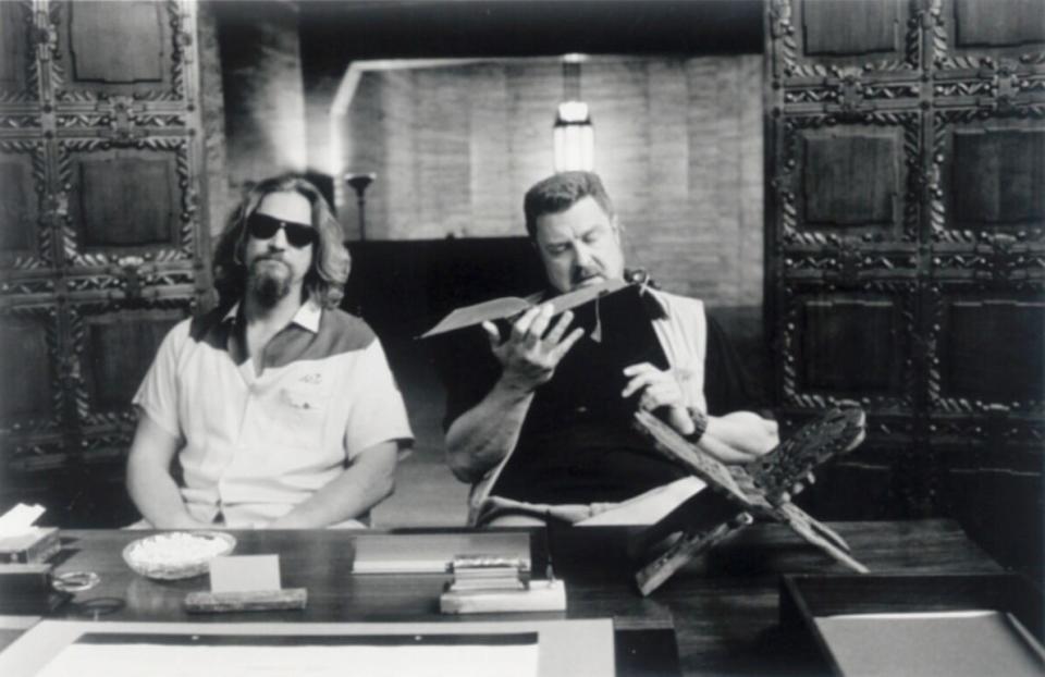 (9a Movies13 Mikesell) (left to right) Jeff Bridges and John Goodman star in the ETHAN and JOEL COEN film "The Big Lebowski". Photo by Merrick Morton.