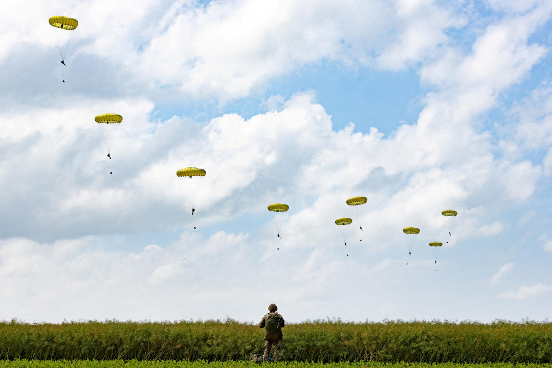 FILE PHOTO: Paratroopers jump into Normandy to pay tribute to the soldiers who parachuted in on D-Day, in Sannerville, Normandy, France, June 5, 2024. UK MOD Crown copyright 2024/Handout via REUTERS