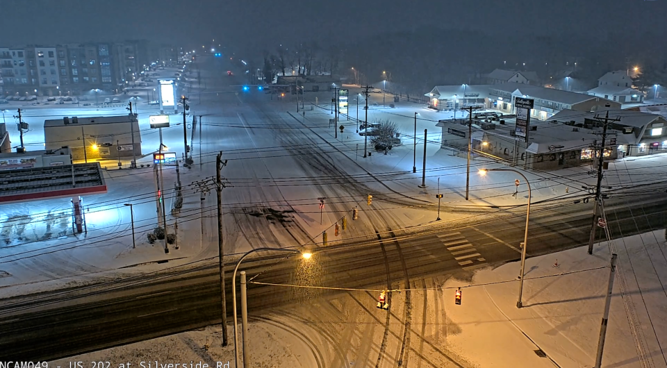 Snow covered roads Monday night in Talleyville as captured by a traffic camera.