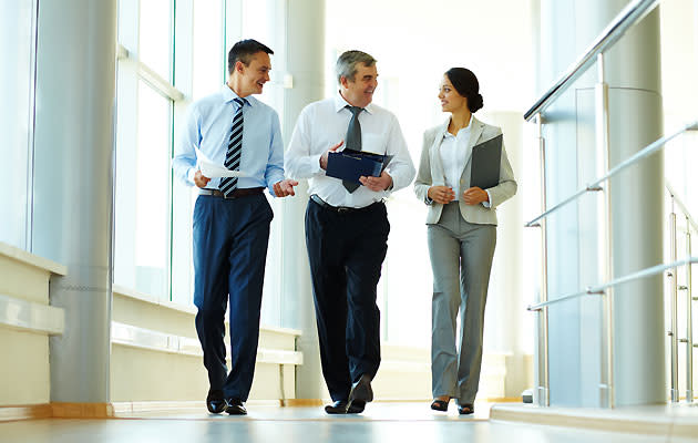 Office workers walking