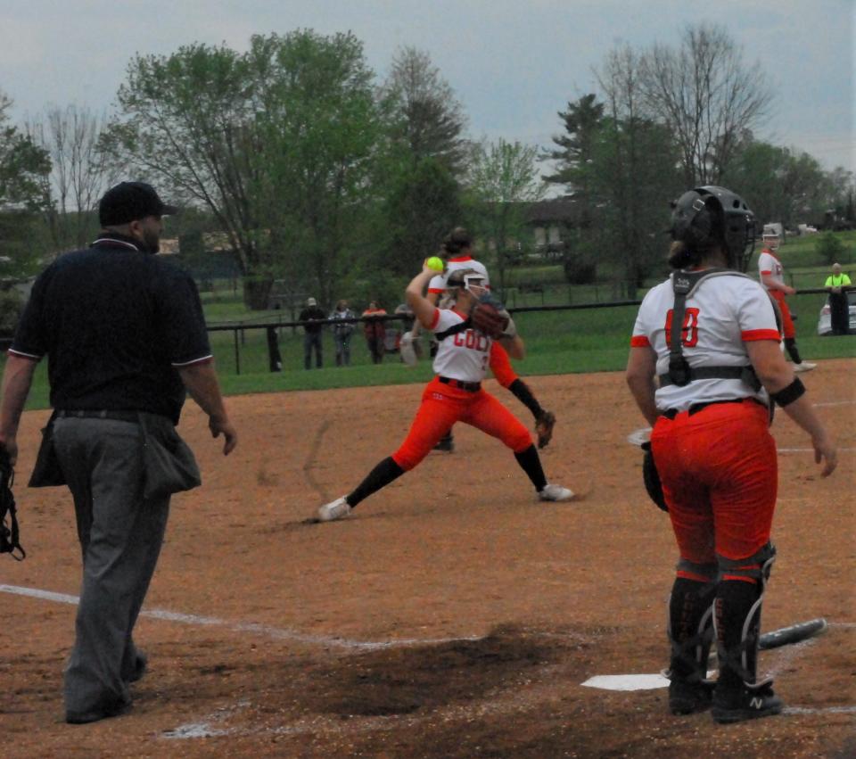 Meadowbrook third baseman Hailey Fordyce throws to first during Monday's Division III sectional semifinal against St. Clairsville. The Colts rallied for an 11-10 win.