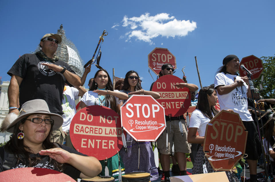 FILE - Tribal councilman Wendsler Nosie, Sr. speaks with Apache activists in a rally to save Oak Flat, land near Superior, Ariz., sacred to Western Apache tribes, in front of the U.S. Capitol in Washington, Tuesday, July 22, 2015. He fought unsuccessfully to stop a major telescope project on a site in southeastern Arizona that Apaches consider sacred: Mount Graham, or Dzil Nchaa Sí’an. (AP Photo/Molly Riley, File)