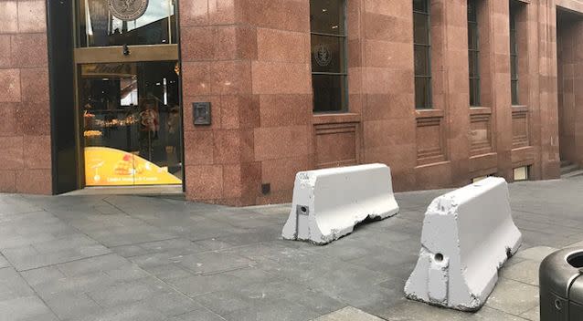 The concrete bollards were placed right at the entrance to the Lindt Cafe