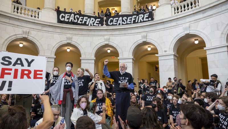 Demonstrators, calling for a cease-fire in the ongoing war between Israel and Hamas, protest inside the Cannon House Office Building at the Capitol in Washington on Wednesday, Oct. 18, 2023.