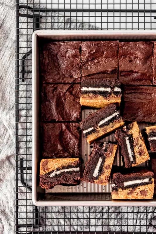 <p>These <strong>Slutty Brownies</strong> are made with classic chocolate chip cookie dough, a layer of <a href="https://parade.com/842041/pambeth/3-ingredient-3-step-oreo-dipped-christmas-cookies/" rel="nofollow noopener" target="_blank" data-ylk="slk:Oreo cookies;elm:context_link;itc:0;sec:content-canvas" class="link ">Oreo cookies</a> for extra crunch, then more fudgy brownie batter—all baked into a delicious treat.</p><p><strong>Get the recipe: </strong><strong><a href="https://parade.com/1230475/kavitharamaswamy/slutty-brownies/" rel="nofollow noopener" target="_blank" data-ylk="slk:Slutty Brownies;elm:context_link;itc:0;sec:content-canvas" class="link ">Slutty Brownies</a></strong></p>