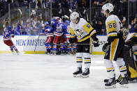 Pittsburgh Penguins defenseman John Marino (6) reacts after New York Rangers left wing Artemi Panarin scored the game winning goal during overtime in Game 7 of an NHL hockey Stanley Cup first-round playoff series, Sunday, May 15, 2022, in New York. The Rangers won 4-3 in overtime. (AP Photo/Adam Hunger)