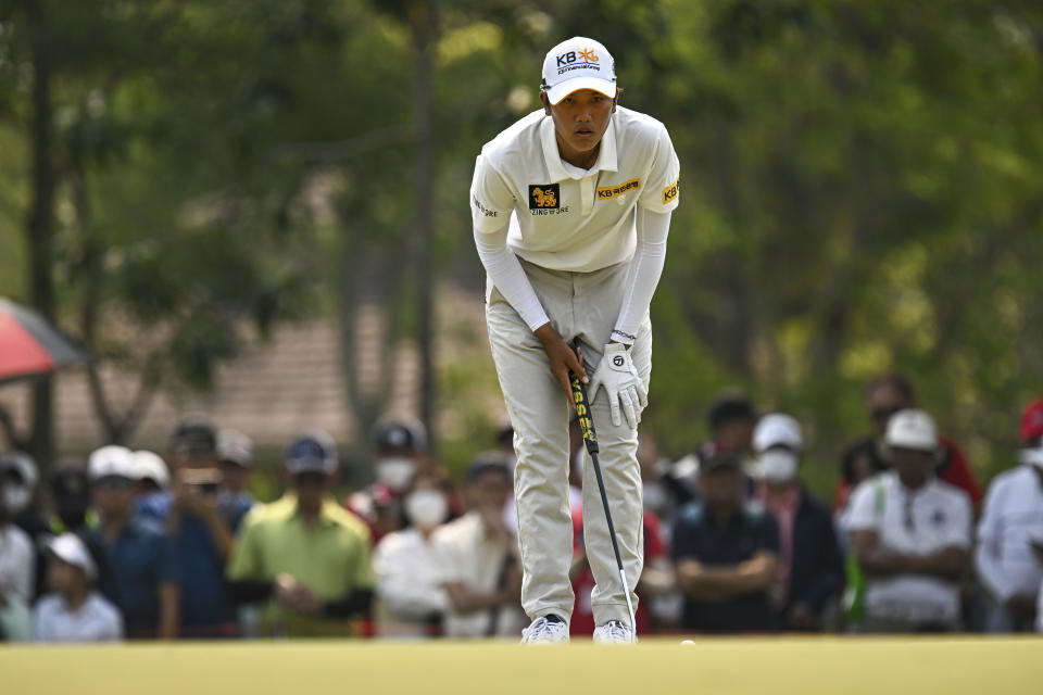 Natthakritta Vongtaveelap of Thailand lines up for a putt on the second hole during the final round of the LPGA Honda Thailand golf tournament in Pattaya, southern Thailand, Sunday, Feb. 26, 2023. (AP Photo/Kittinun Rodsupan)