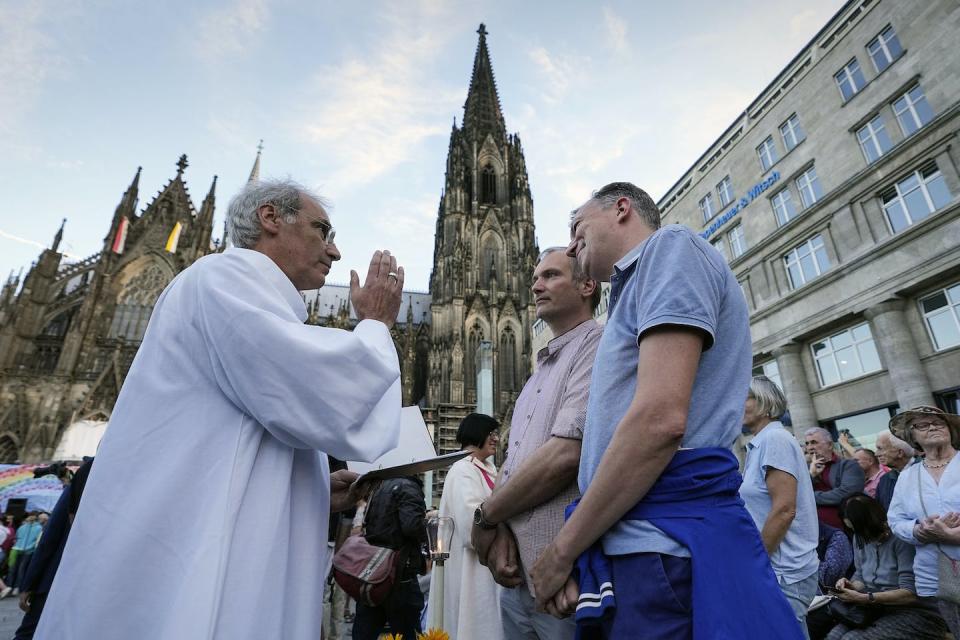 Same-sex couples take part in a Catholic public blessing ceremony in Cologne, Germany, on Sept. 20, 2023. <a href="https://newsroom.ap.org/detail/VaticanLGBTQExplainer/fd76861aa59c4f43ab97ac397e74b082/photo?Query=pope%20francis%20same%20sex&mediaType=photo&sortBy=&dateRange=Anytime&totalCount=46&currentItemNo=13" rel="nofollow noopener" target="_blank" data-ylk="slk:AP Photo/Martin Meissner;elm:context_link;itc:0;sec:content-canvas" class="link ">AP Photo/Martin Meissner</a>