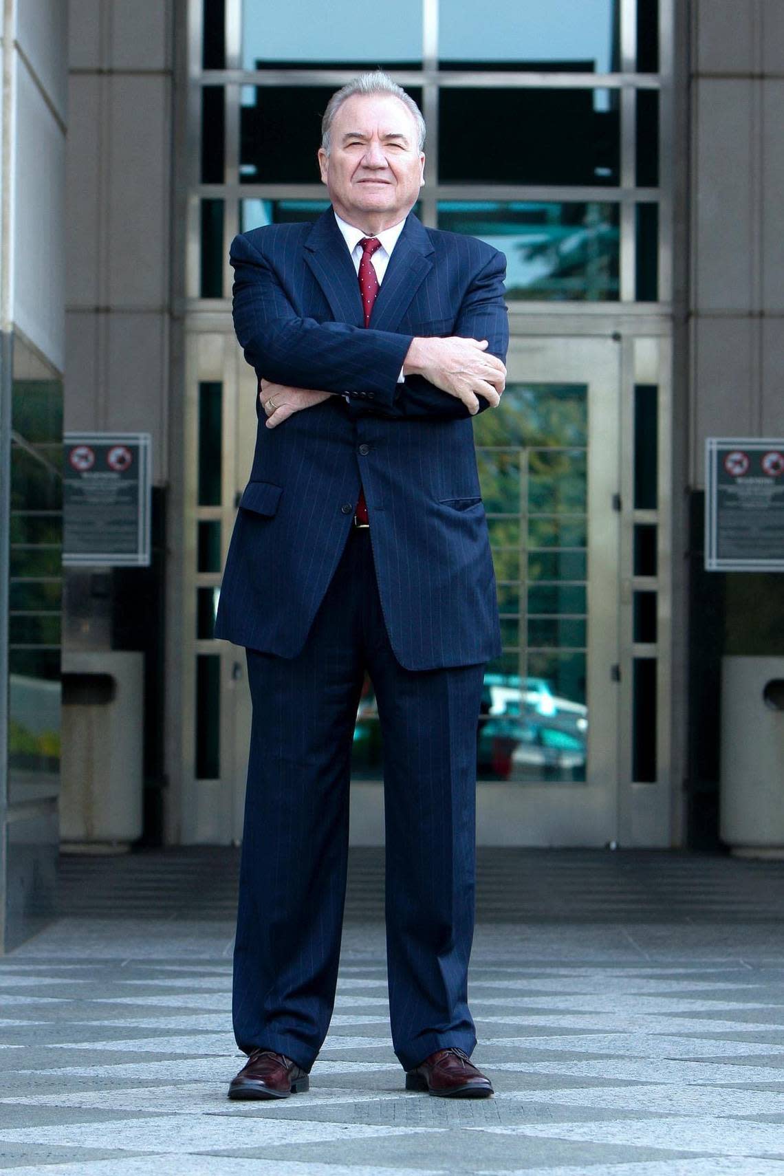 Attorney Donald Heller stands at the entrance to the Robert T. Matsui U.S. Courthouse in downtown Sacramento, where he fought for many clients as a defense attorney.