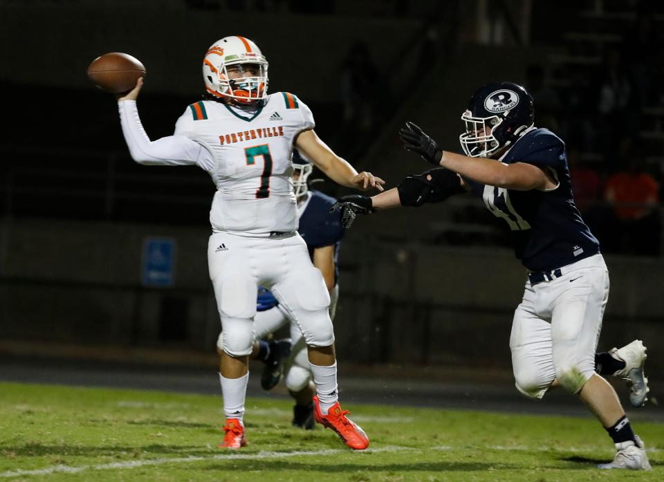 Porterville's Rocky Arguijo looks to pass against Redwood during their high school football game in Visalia, Calif., Friday, Oct. 7, 2022.