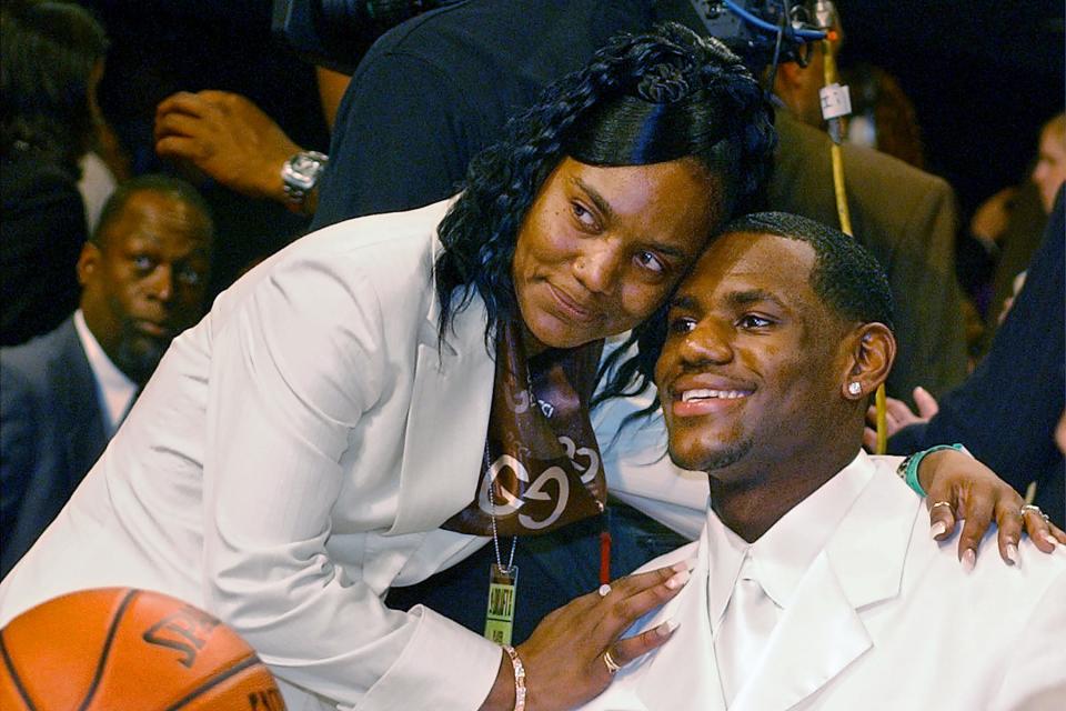 Gloria James hugs her son, LeBron, as they attend the 2003 NBA Draft on June 26, 2003, in New York.