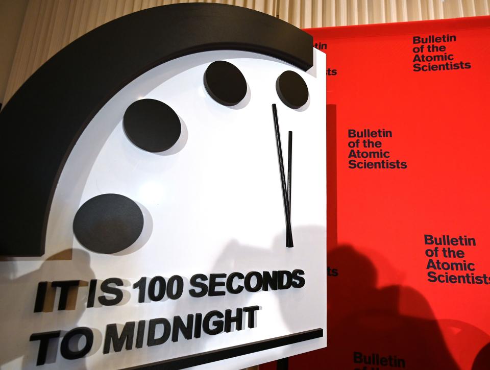 The Doomsday Clock reads 100 seconds to midnight, a decision made by The Bulletin of Atomic Scientists.