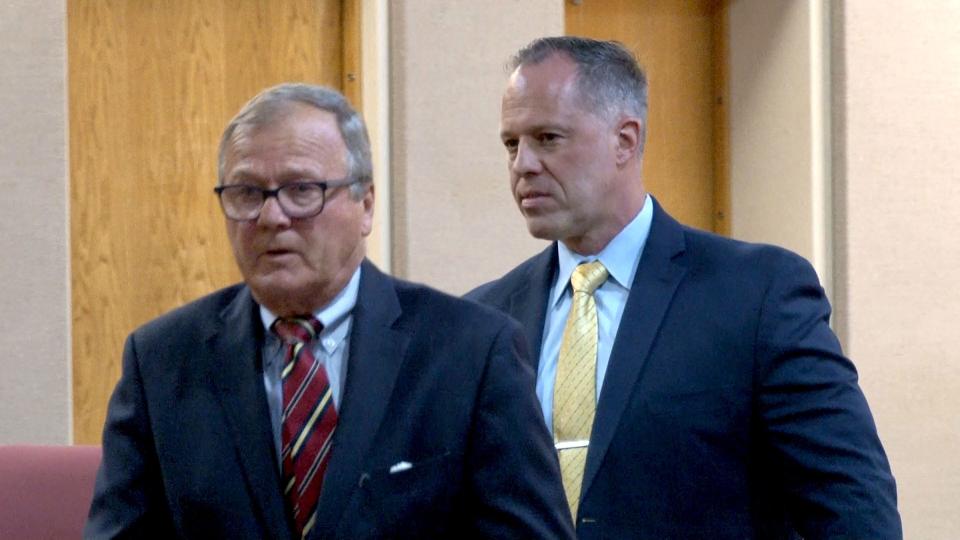 Former Howell Township Police Chief Andrew Kudrick (right) walks with his attorney Robert Honecker after pleading guilty to providing false statements in a township investigation and trying to conceal a sexual affair with a subordinate during a hearing before Superior Court Judge Paul X. Escandon in Freehold Monday, May 13, 2024.