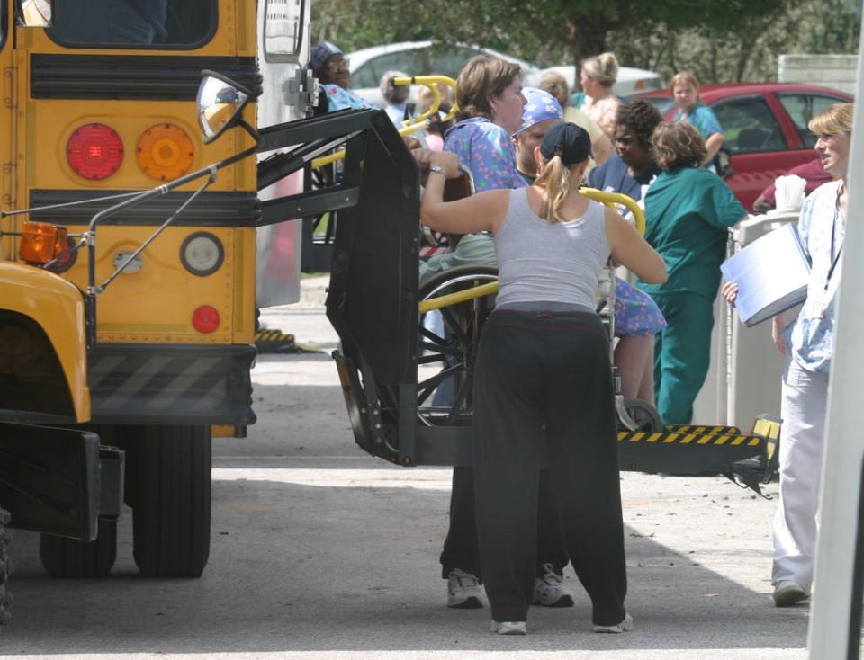 HURRICANE CHARLEY- LAKE WALES- Residents of The Grove Center, a nursing and rehabilitation center werebeing evacuated Saturday morning. Photo taken in Lake Wales, Florida, August 14, 2004. The Ledger/Paul Johnson