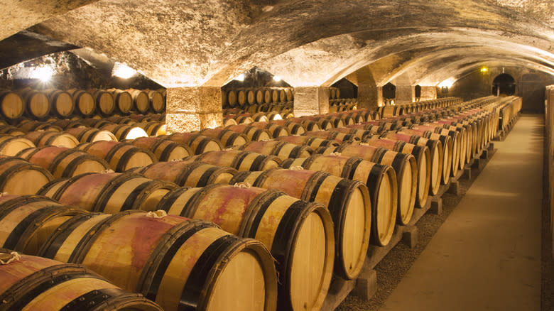 Large wine cellar filled with barrels