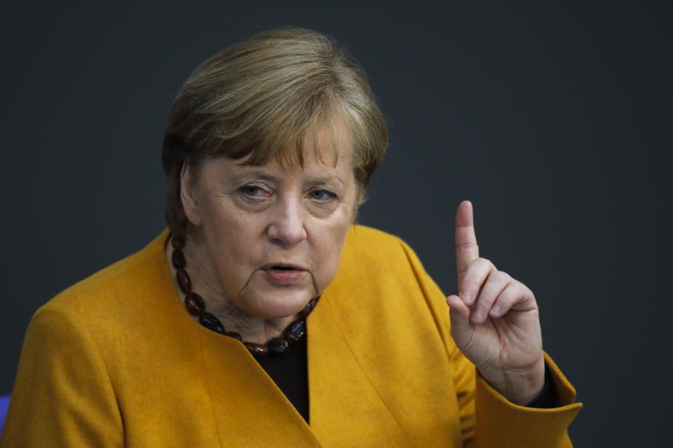 File - In this Wednesday, March 24, 2021 file photo German Chancellor Angela Merkel answers questions from lawmakers at German parliament Bundestag in Berlin, Germany. German Chancellor Angela Merkel has talked about her country’s difficulties, during the coronavirus pandemic. In a lengthy television interview late Sunday she called for greater flexibility to tackle the latest surge in cases. (AP Photo/Markus Schreiber)