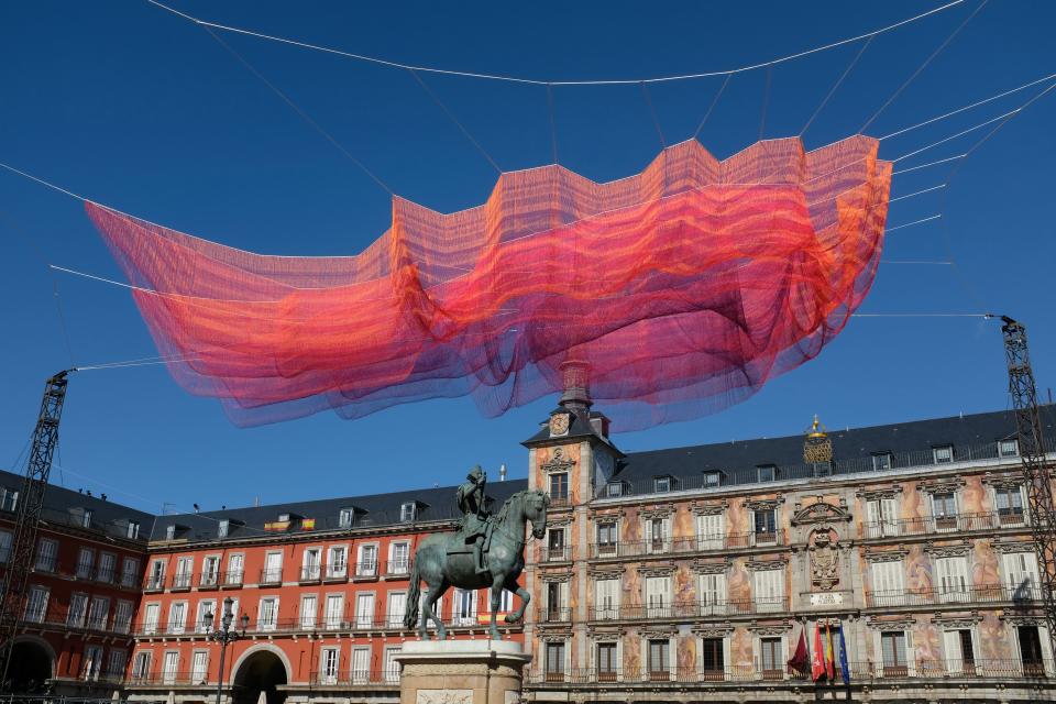 An installation by US artist Janet Echelman is installed on the Plaza Mayor square in central Madrid, Spain, 08 February 2018. The piece, made up of layered mesh, will be on display from 09 to 19 February to mark the end of the 400-year anniversary celebrations of the famous Madrid square.Installation by US artist Janet Echelman on the Plaza Mayor in Madrid, Spain - 08 Feb 2018