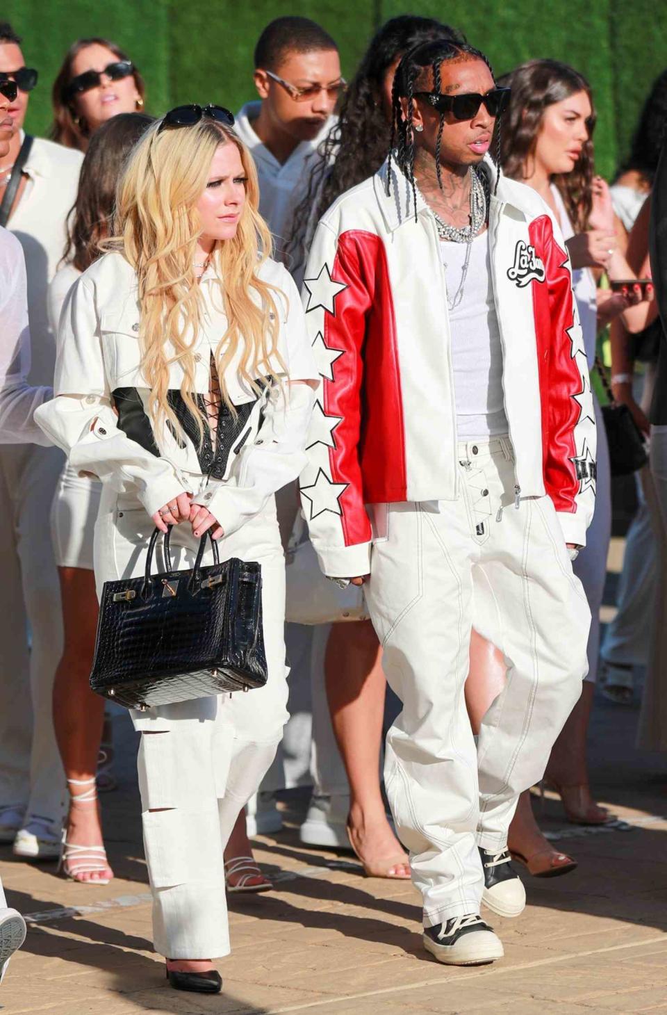 <p>affinitypicture / BACKGRID</p> Avril Lavigne and Tyga on July 4, 2023