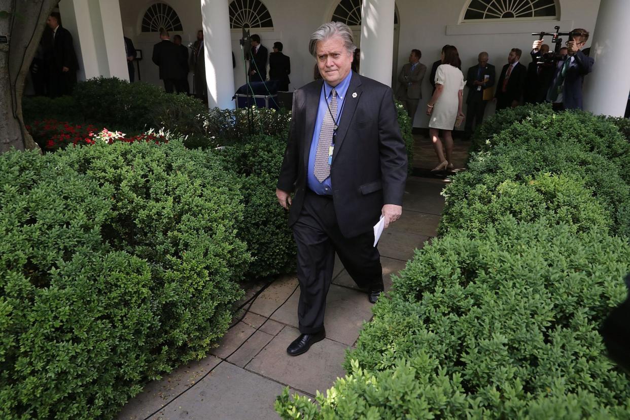 White House Chief Strategist Steve Bannon walks into the Rose Garden before President Donald Trump announces his decision to pull out of the Paris climate agreement: Getty Images