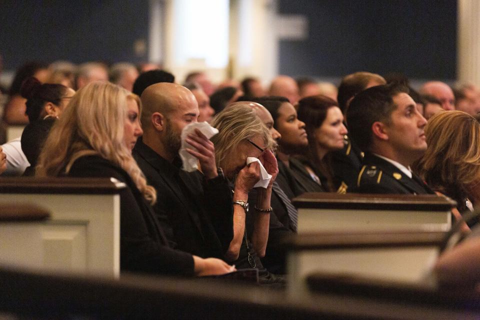 Families and friends could not hold back their tears during the funeral of U.S. Army Green Beret Master Sgt. Luis DeLeon-Figueroa at Bethany Assembly of God Church in Agawam Tuesday. (Hoang 'Leon' Nguyen / The Republican)