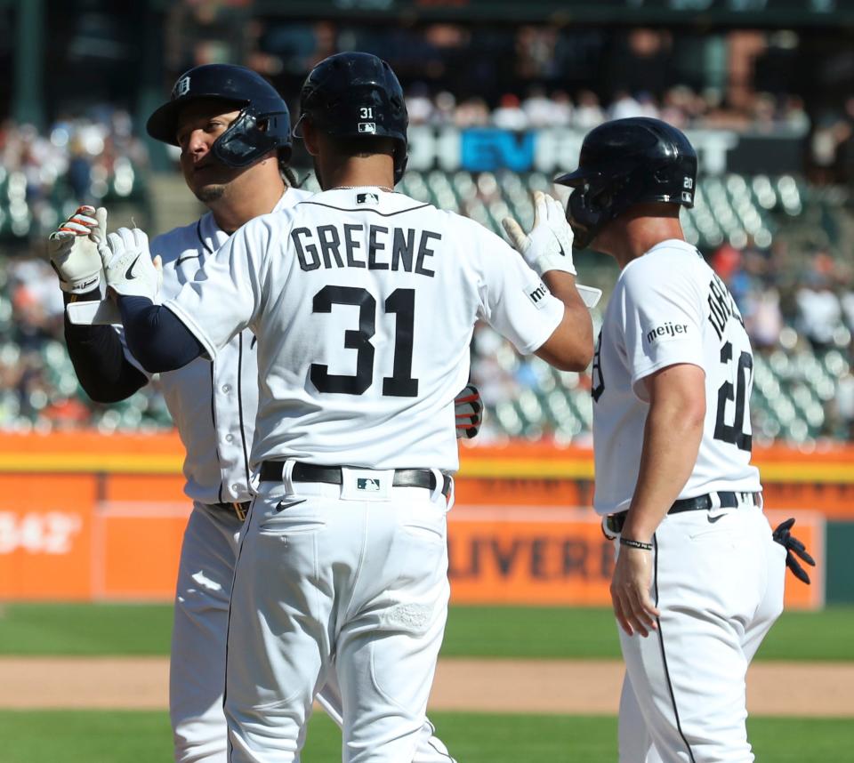 Detroit Tigers DH Miguel Cabrera is met by teammates Riley Greene and Spencer Torkleson after his three-run homer against Houston Astros reliever Phil Maton (88) during eighth-inning action at Comerica Park in Detroit on Sunday, Aug. 27, 2023.
