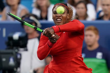 Aug 13, 2018; Mason, OH, USA; Serena Williams (USA) returns a shot against Daria Gavrilova (AUS) in the Western and Southern tennis open at Lindner Family Tennis Center. Aaron Doster-USA TODAY Sports