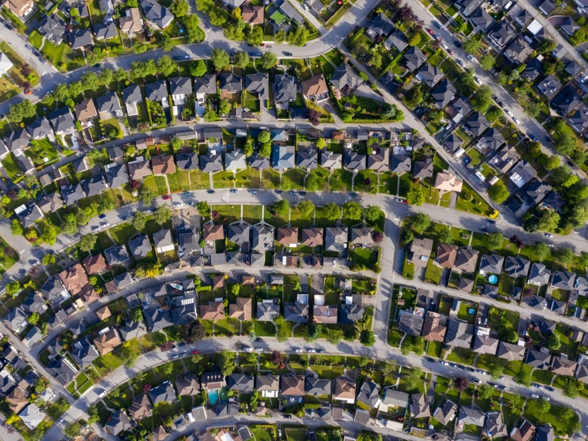 A subdivision in Burnaby, B.C., is shown in this aerial photo from 2019. Home prices in suburbs were especially hot during the COVID-19 pandemic, a trend that may be starting to reverse. (SeongJoon Cho/Bloomberg - image credit)