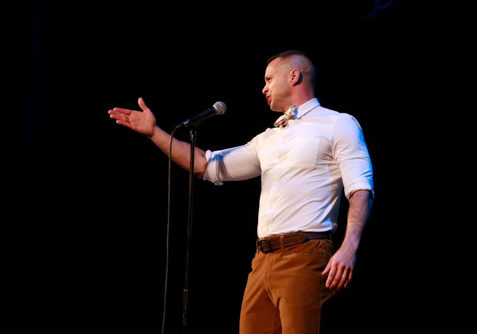 Erik Dominguez shares his story about a journey back to his childhood home in Tucson during the Des Moines Register's Storytellers Project at Hoyt Sherman Place on Tuesday, June 14, 2022.