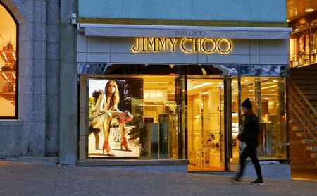 A store of shoe designer Jimmy Choo is seen in the mountain resort of St. Moritz, Switzerland March 15, 2016. REUTERS/Arnd Wiegmann/Files