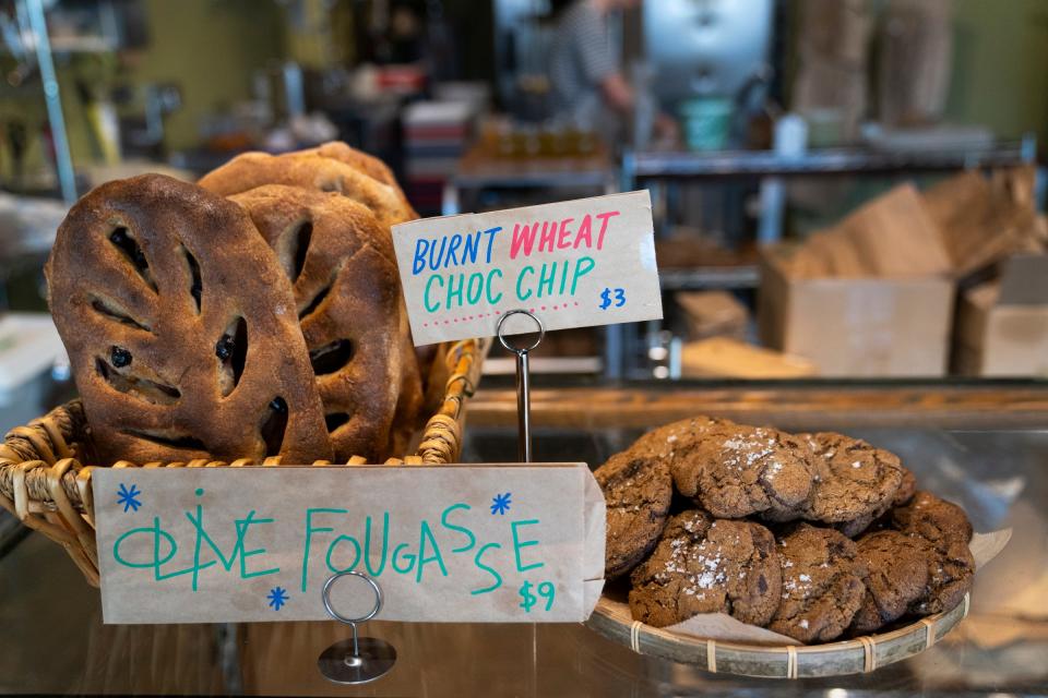 Olive Fougasse and burnt wheat chocolate chip cookies are ready for sale at There is No Secret Bakery located at 821 Livernois Street in Ferndale on Wednesday, Feb. 7, 2024. The bakery is owned by Maxwell Leonard and is open Wednesdays from 10am-3pm and Saturdays from 9am to 2pm.