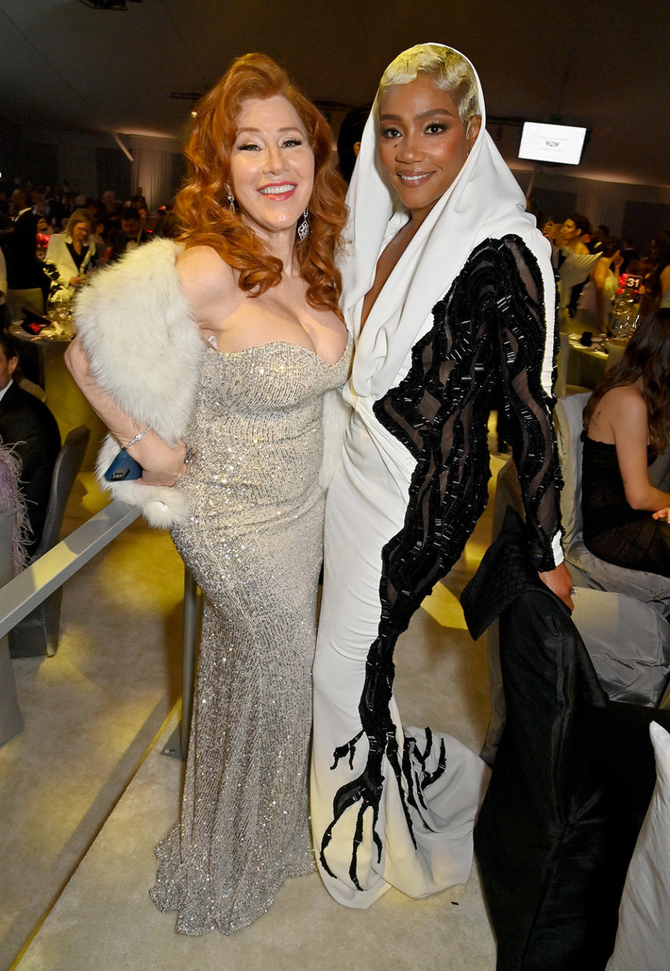 (L-R) Lisa Ann Walter and Tiffany Haddish attend the Elton John AIDS Foundation's 31st Annual Academy Awards Viewing Party on March 12, 2023 in West Hollywood, California.