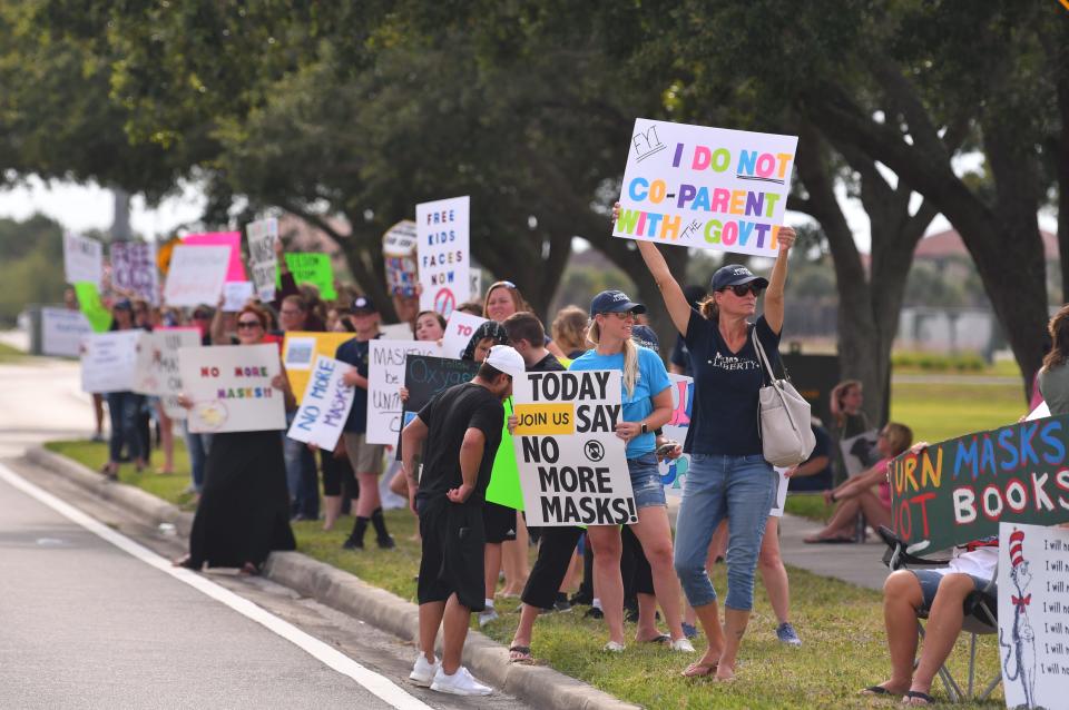 Brevard Moms for Liberty held an anti-mask rally before a May 2021 school board meeting, asking the school board to drop the mask mandate. A fairly large group of parents, students and concerned citizens showed up before the meeting to wave signs at passing cars.