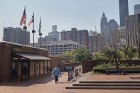 A man walks outside One Police Plaza NYPD Headquarters on Friday, Sept. 13, 2024, in New York. (AP Photo/Andres Kudacki)