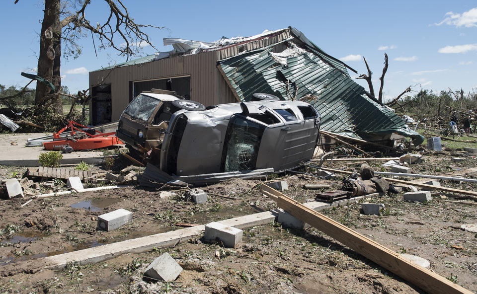 Debris and overturned vehicle