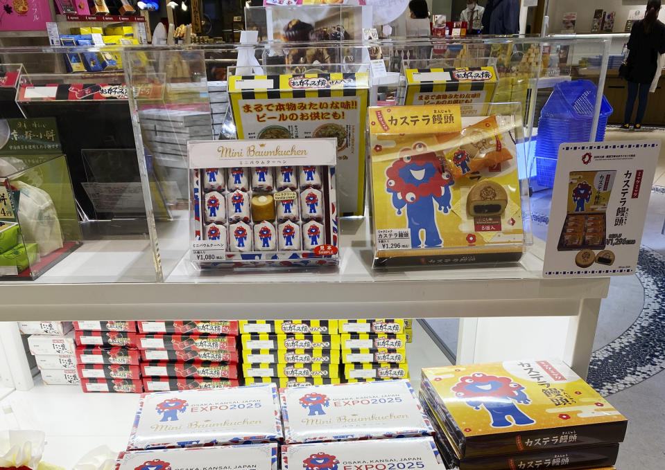 Gift boxes of cakes publicizing Expo 2025, for sale at a shop in Osaka’s Itami airport on April 21, 2024. The packaging features the red-and-blue “Myaku-Myaku” mascot. (Katherine Roth via AP)