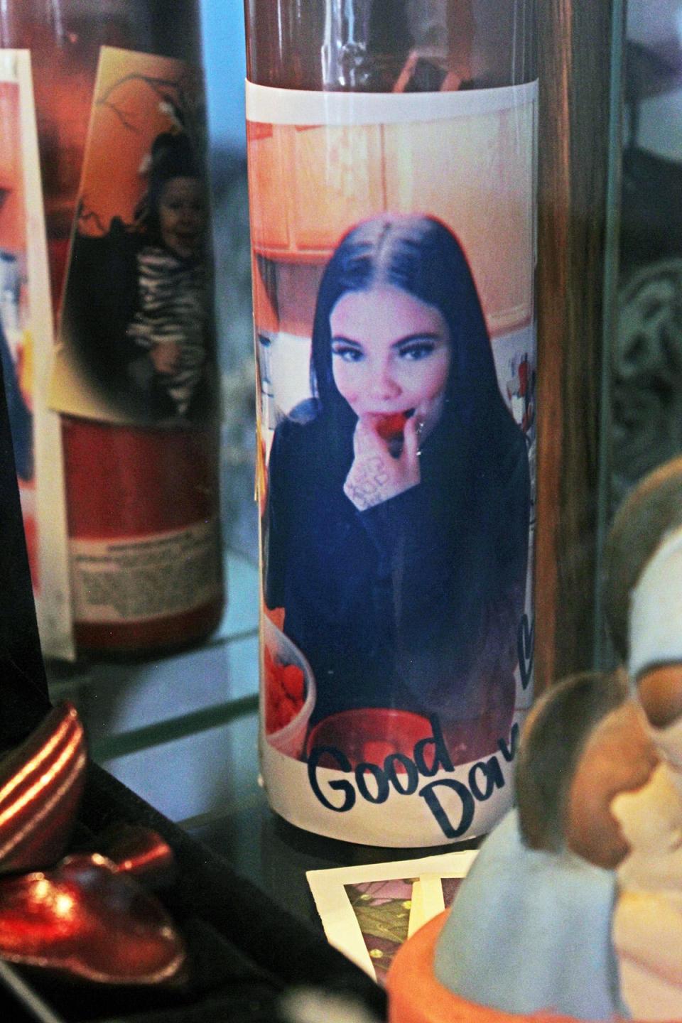 A memorial candle features a picture of 13-year-old Hailey Perkins whose life was tragically cut short the day before her 14th birthday when she was shot to death in her Pueblo West home.