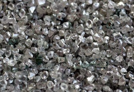 Rough diamonds during their sorting process are seen at the Botswana Diamond Valuing Company in Gaborone, Botswana, in this August 26, 2004 file photo. REUTERS/Juda Ngwenya/Files