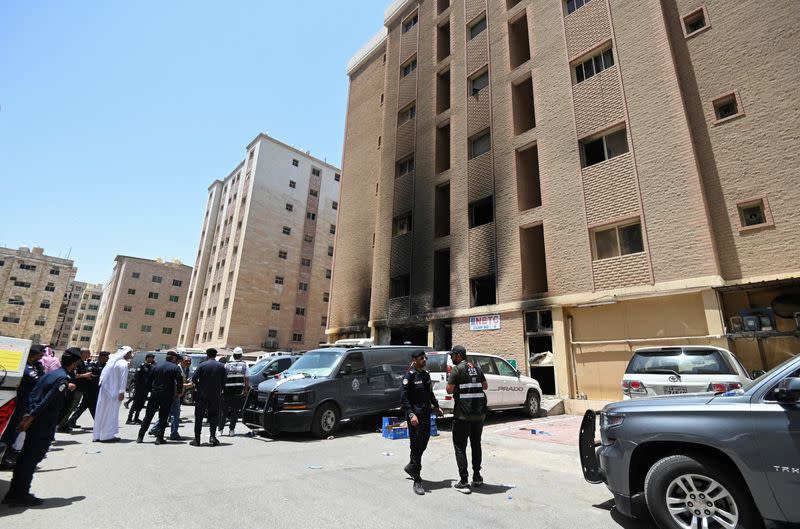 Aftermath of a deadly fire in a building, in Mangaf