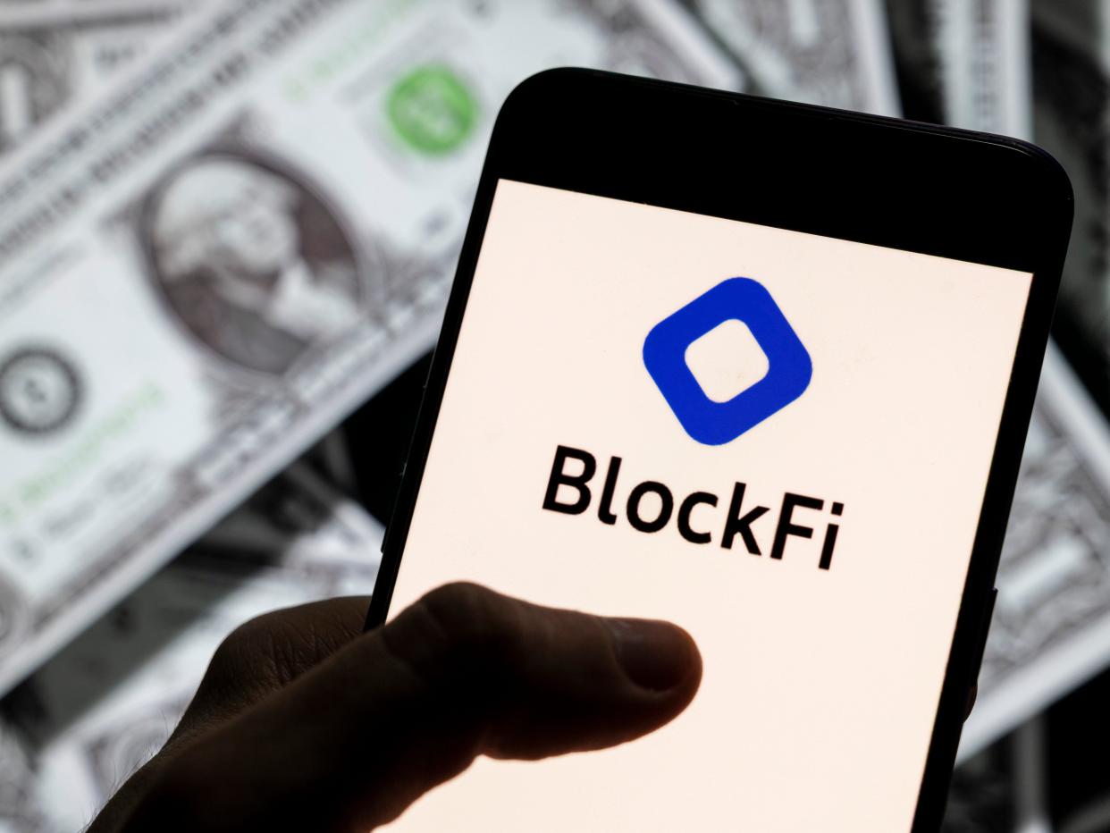 In this photo illustration, the cryptocurrency exchange trading platform Blockfi logo is seen on an Android mobile device screen with the currency of the United States dollar icon.